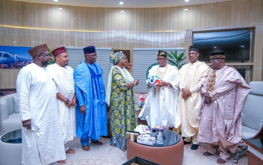 Bala Mohammed Receives Signed World Cup Ball From Canadian Player